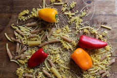 Top view of the Italian pasta fusilli with fresh vegetables, tomatoes and paprika royalty free stock photos Top view of the Italian pasta fusilli with fresh vegetables, tomatoes and paprika royalty free stock photos