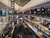 Top view of a luxurious mall interior with people shopping royalty free stock photos Top view of a luxurious mall interior with people shopping royalty free stock photos