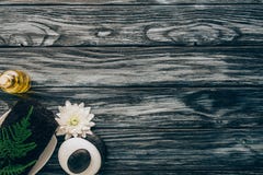Top View Of Arranged Spa And Massage Accessories With Towel, Pebbles, Essential Oil And Chrysanthemum Flower Stock Images Top View Of Arranged Spa And Massage Accessories With Towel, Pebbles, Essential Oil And Chrysanthemum Flower Stock Images