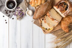 Top View Of Baked Bread And Wheat On White Wood Background Royalty Free Stock Images
