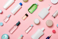 Top View Of Different Cosmetic Bottles And Container For Cosmetics On Pink Background. Flat Lay Composition With Copy Space Stock Photography Top View Of Different Cosmetic Bottles And Container For Cosmetics On Pink Background. Flat Lay Composition With Copy Space Stock Photography