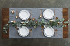 Top View Of Rustic Table Setting With Eucalyptus, Tarnished Cutlery, Wine Glasses, Candles And Empty Plates On Tabletop Royalty Free Stock Photo Top View Of Rustic Table Setting With Eucalyptus, Tarnished Cutlery, Wine Glasses, Candles And Empty Plates On Tabletop Royalty Free Stock Photo