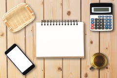 Top view of open spiral blank notebook with smartphone, calculat stock images Top view of open spiral blank notebook with smartphone, calculat stock images