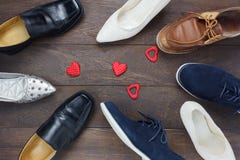 Top view red heart shape with fashionable several men`s shoes royalty free stock photography Top view red heart shape with fashionable several men`s shoes royalty free stock photography