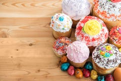 Top View Russian Easter Cakes In Glaze And Decorations On Wooden