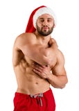 Torso Santa Claus no chapéu vermelho com o corpo muscular, isolado fotos de stock Torso Santa Claus no chapéu vermelho com o corpo muscular, isolado fotos de stock