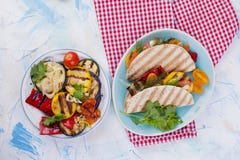Tortilla with vegetables and salmon. Fitness food. Healthy lunch. Vegetables and fish. Summer menu, flat lay, stock photos Tortilla with vegetables and salmon. Fitness food. Healthy lunch. Vegetables and fish. Summer menu, flat lay, stock photos