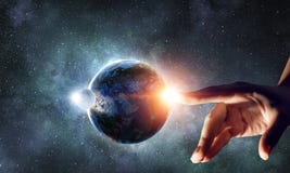 Touching planet with finger royalty free stock image Touching planet with finger royalty free stock image