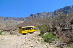 Tour bus climbing at Sani Pass trail between South Africa and Lesotho Royalty Free Stock Photos Tour bus climbing at Sani Pass trail between South Africa and Lesotho Royalty Free Stock Photos