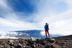 Tourist admiring breathtaking view of Mauna Loa volcano on the Big Island of Hawaii, USA Stock Photography Tourist admiring breathtaking view of Mauna Loa volcano on the Big Island of Hawaii, USA Stock Photography