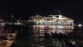 Nighttime cruise ship leaving Venice, Italy