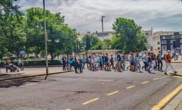 Tourist group crossing at a busy Brighton Road royalty free stock image Tourist group crossing at a busy Brighton Road royalty free stock image