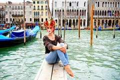 Tourist In Venice Wearing A Carnival Mask Royalty Free Stock Image
