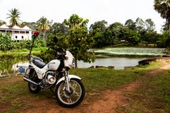 Tourist Police Motorcycle with lake in Angkor Wat, Cambodia stock image Tourist Police Motorcycle with lake in Angkor Wat, Cambodia stock image