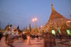 Tourists And Local Devotees In Crowded Shwedagon Pagoda In The Evening During Sunset Royalty Free Stock Photos Tourists And Local Devotees In Crowded Shwedagon Pagoda In The Evening During Sunset Royalty Free Stock Photos