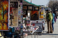 Tourists and Bouquinistes Stock Images Tourists and Bouquinistes Stock Images