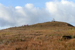Tourists climb to the monument of the Albatross on the Cape,erected in honor of sailors who died while trying to round Cape horn. Royalty Free Stock Photo Tourists climb to the monument of the Albatross on the Cape,erected in honor of sailors who died while trying to round Cape horn. Royalty Free Stock Photo