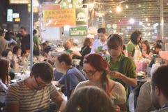 Tourists enjoy the street food at the night market in Chinatown, Royalty Free Stock Image Tourists enjoy the street food at the night market in Chinatown, Royalty Free Stock Image