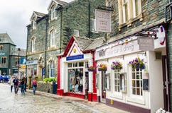 Tourists Strolling around a Historic Town stock photo Tourists Strolling around a Historic Town stock photo