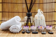 Towels candles and stones on bamboo background Royalty Free Stock Photography Towels candles and stones on bamboo background Royalty Free Stock Photography