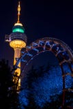 The tower and the rollercoaster ,Duryu Park Tower Starry Night Illuminations Daegu South Korea stock image The tower and the rollercoaster ,Duryu Park Tower Starry Night Illuminations Daegu South Korea stock image