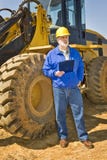 Trabajador de construcción Holding Clipboard fotografía de archivo Trabajador de construcción Holding Clipboard fotografía de archivo