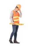 Trabalhador da construção no waistcoat alaranjado imagem de stock royalty free Trabalhador da construção no waistcoat alaranjado imagem de stock royalty free