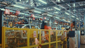Trabalho da robótica do Time Lapse na linha de produção de carro vídeos de arquivo Trabalho da robótica do Time Lapse na linha de produção de carro vídeos de arquivo