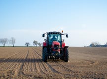 Tractor plowing fields Stock Photos Tractor plowing fields Stock Photos