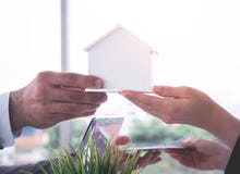 Trading home for cash home loan and buying concept stock photo Trading home for cash home loan and buying concept stock photo