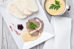 Traditional Czech and Slovak sirloin with cream sauce and dumplings royalty free stock photography Traditional Czech and Slovak sirloin with cream sauce and dumplings royalty free stock photography