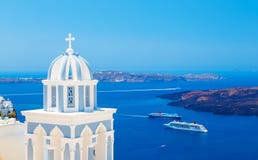 Traditional dome of the Church on background Caldera, cruise ship and sea Stock Image Traditional dome of the Church on background Caldera, cruise ship and sea Stock Image