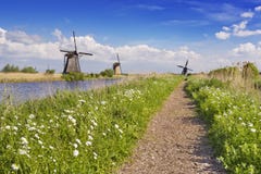 Traditional Dutch windmills on a sunny day at the Kinderdijk stock photography Traditional Dutch windmills on a sunny day at the Kinderdijk stock photography