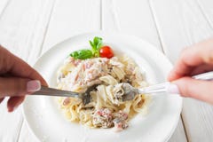 Traditional eating of pasta carbonara, eater pov stock photos Traditional eating of pasta carbonara, eater pov stock photos