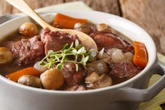 Traditional French food: Coq au vin with wine and vegetable Stock Photos Traditional French food: Coq au vin with wine and vegetable Stock Photos
