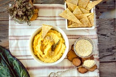 Traditional Middle east appetizer Hummus served with herbs, seasoned with in vintage ceramic plate. Top View stock photography Traditional Middle east appetizer Hummus served with herbs, seasoned with in vintage ceramic plate. Top View stock photography