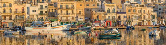 Traditional old fishing village Marsaskala at sunrise in Malta stock photo Traditional old fishing village Marsaskala at sunrise in Malta stock photo