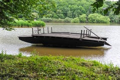 Traditional wooden raft floating on lake royalty free stock images Traditional wooden raft floating on lake royalty free stock images