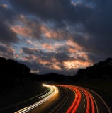 Traffic lights on the road at sunset royalty free stock photos Traffic lights on the road at sunset royalty free stock photos