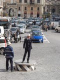 Traffic policeman regulating traffic on city streets.