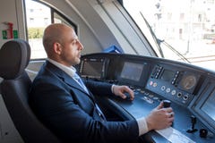 Train driver in cabin royalty free stock photo Train driver in cabin royalty free stock photo