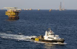 Transport vessel and rigs stock photo Transport vessel and rigs stock photo