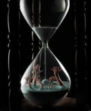 Trapped. In hourglass struggling to come out Trapped. In hourglass struggling to come out