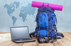 Travel blog concept. With backpack and notebook Travel blog concept. With backpack and notebook