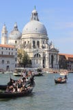 Travel the canals of Venice seeing the sights of architecture