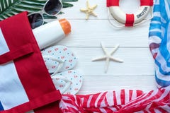 Travel Plan. Traveler Planning Trips Summer Vacations On The Beach With Traveler`s Accessories, Retro Camera, Sunblock In Summert Stock Images Travel Plan. Traveler Planning Trips Summer Vacations On The Beach With Traveler`s Accessories, Retro Camera, Sunblock In Summert Stock Images