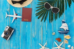 Travel Plan. Traveler Planning Trips Summer Vacations On The Beach With Traveler`s Accessories, Retro Camera, Sunblock, Sunglasse Stock Photos