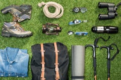 Traveler set on grassy background stock photo Traveler set on grassy background stock photo