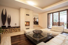 Travertine house: beige living room