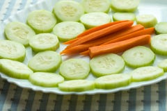 Tray of cucumbers and carrots Stock Photo Tray of cucumbers and carrots Stock Photo
